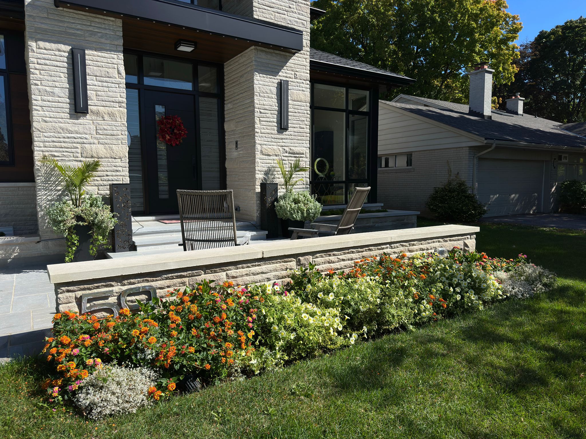 Modern house with colorful flower garden