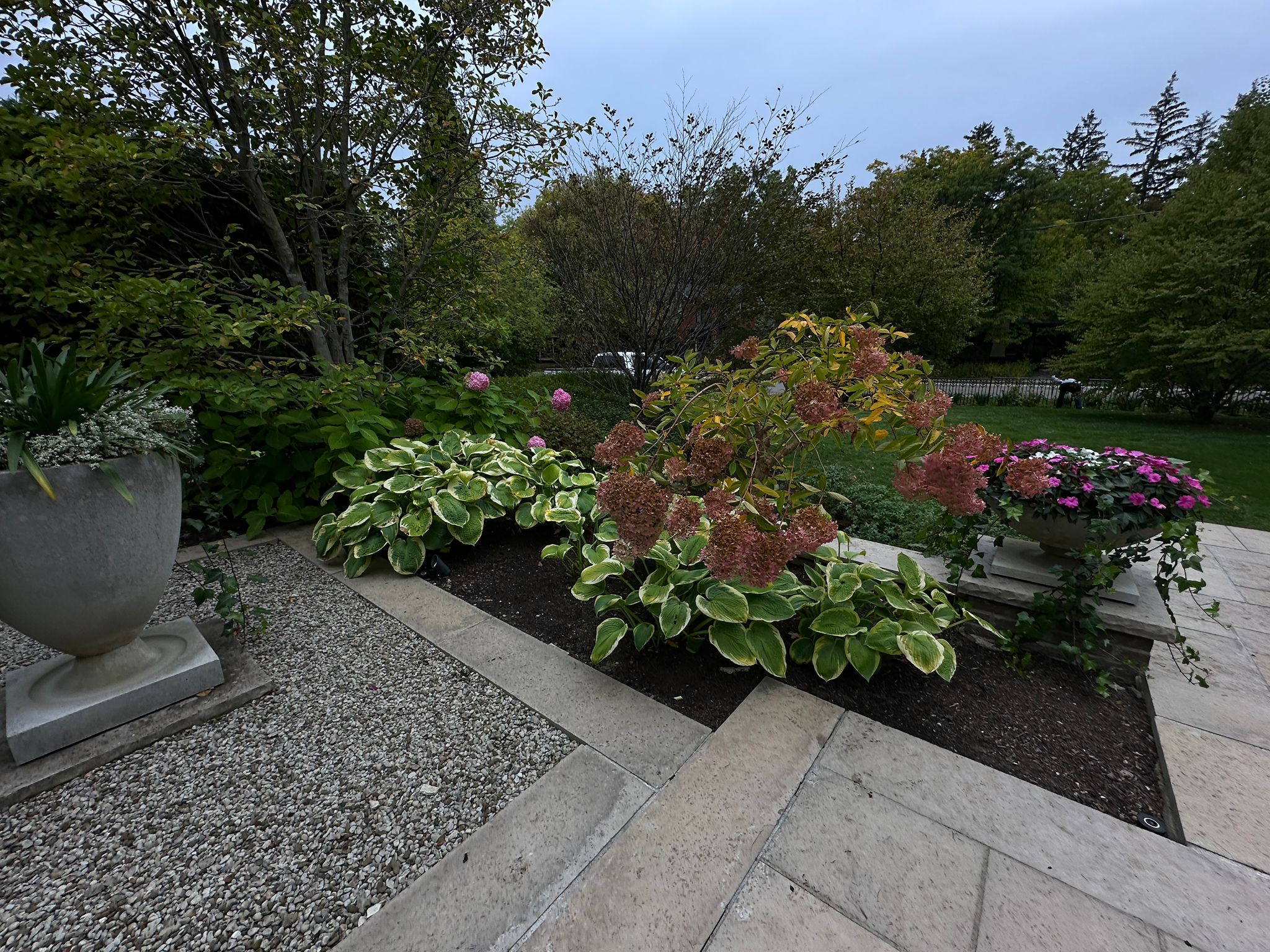 Garden with colorful flowers and stone pathway